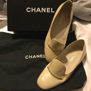 Chanel flats with gold embellishments